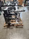 BLACK SIT STAND BASES ON PALLET.webp